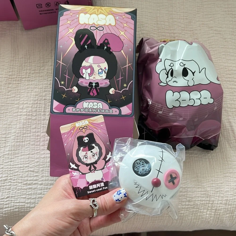 Plush Doll with Pink Hood